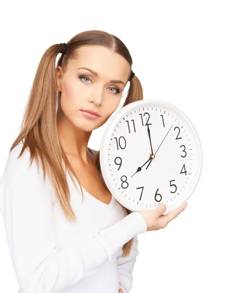 Женщина держит большие часы Лицензионные Стоковые Фото
