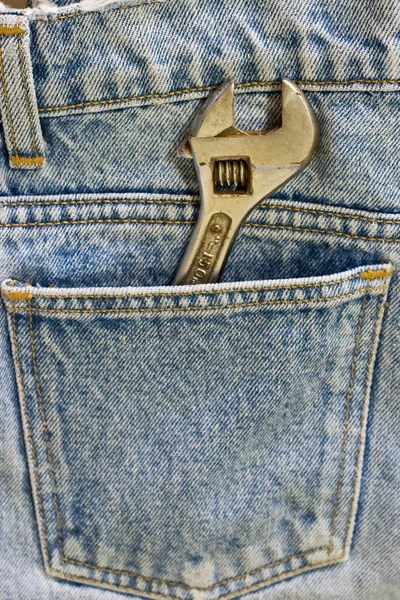 Wrench inside pocket — Stock Photo, Image