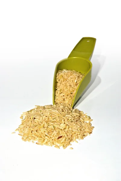 Pirinç ve kaşık — Stok fotoğraf