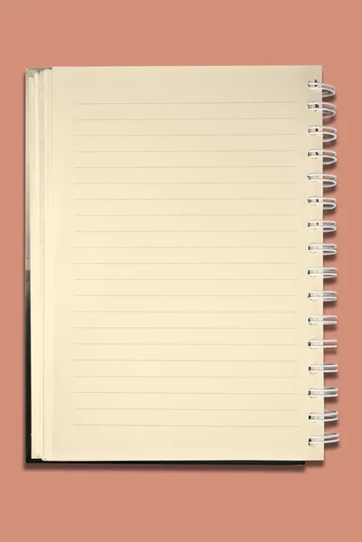 Cuaderno en blanco sobre el fondo de color — Foto de Stock