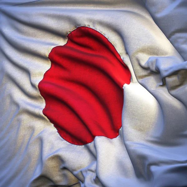 stock image Japanese flag, fluttering in the breeze, backlit rising sun. Sewn from pieces of cloth, a very realistic detailed state flag with the texture of fabric flutteri