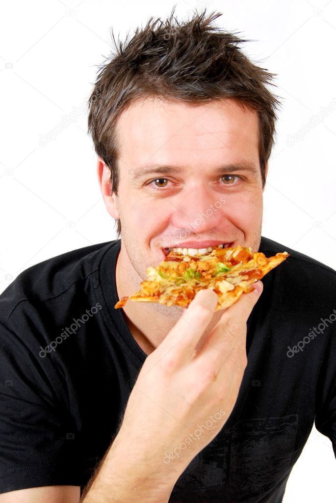 Man taking a bite of pizza