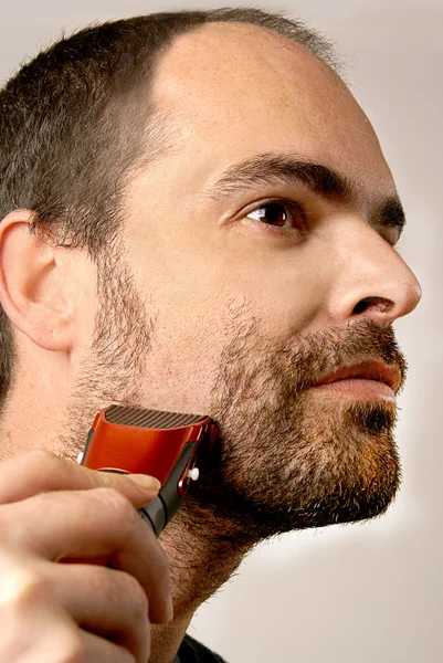 stock image Man shaving facial hair