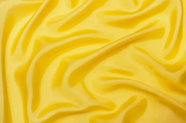Fondo Seda Color Amarillo Brillante Con Ondas —  Fotos de Stock