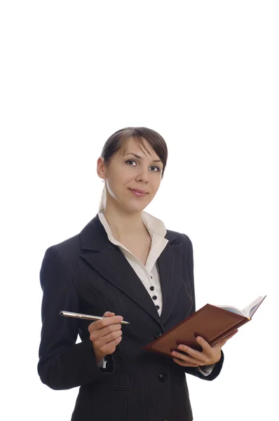 Affärskvinna med anteckningsbok och penna — Stockfoto