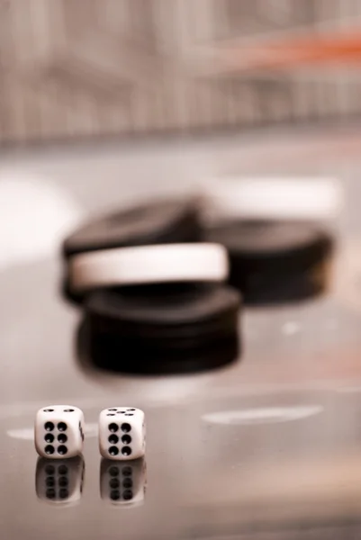 stock image Checkers and dice for the game on the board