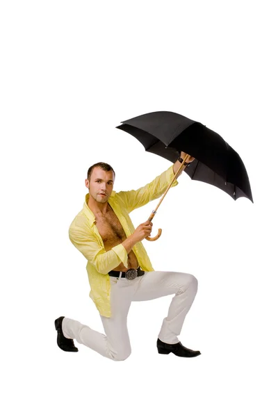 De jonge man met een paraplu — Stockfoto