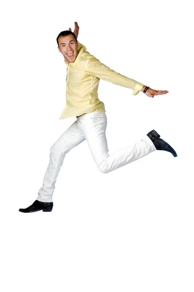 Adam beyaz bir arka plan üzerinde atlama — Stok fotoğraf