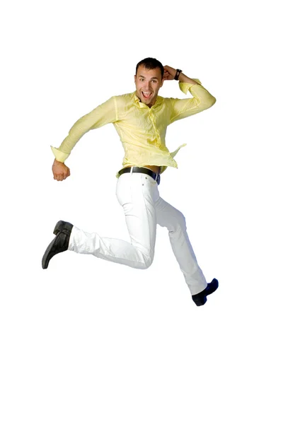 Чоловік стрибає на білому тлі — стокове фото