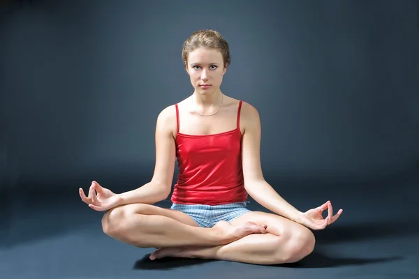 stock image Young female practicing yoga