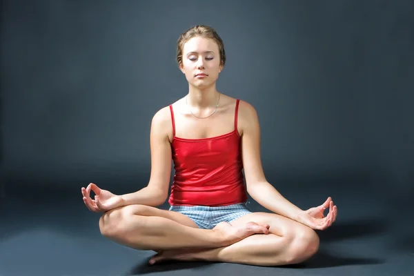 Stock image Young female practicing yoga