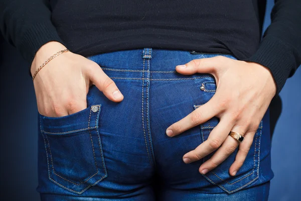 stock image Man holds a woman's buttocks