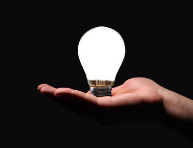 Hand with lightbulb clipart