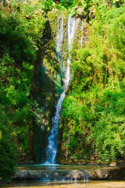 Waterfall in the botanical garden at Balchik, Bulgaria. clipart