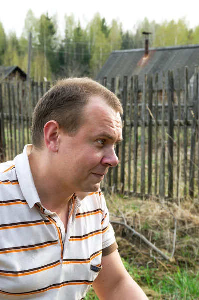 stock image Man in the village. Portrait in Profile