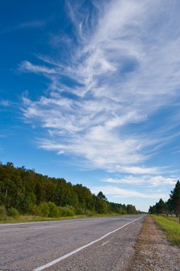 Road under skies clipart