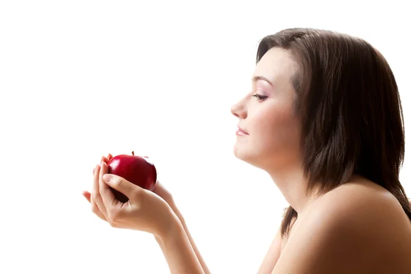 Frau hält Apfel lizenzfreie Stockfotos