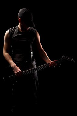 Man playing on guitar clipart