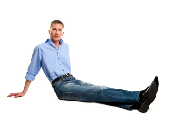 Geïsoleerd zittend op de vloer-man — Stockfoto