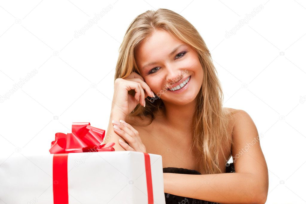 Blonde woman holding heart shaped box over white