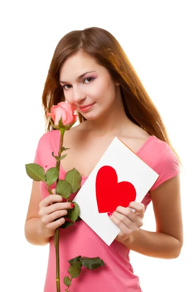 Vrouw met kaart en roze bloem — Stockfoto