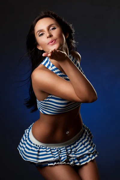 Sexy Woman Portrait Wearing Striped Costume Blowing Kiss — Stock Photo, Image