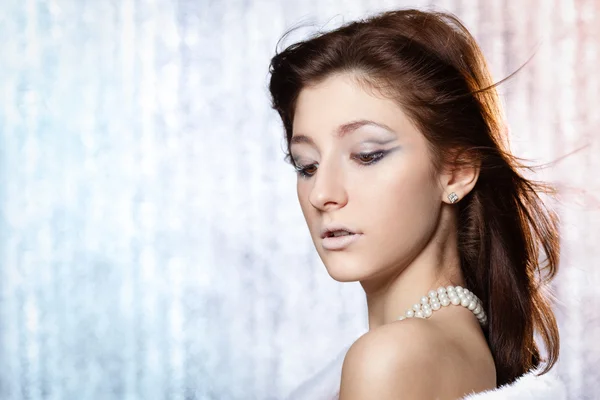 Vrouw met creatieve winter make-up — Stockfoto