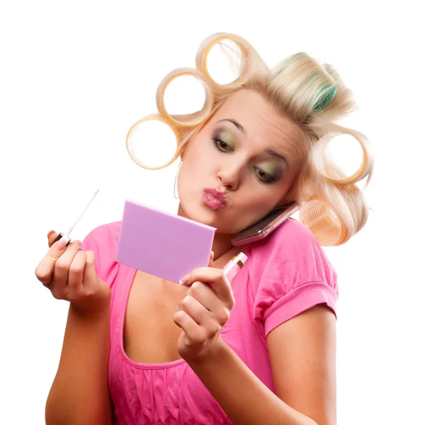 Blonde woman with rollers — Stock Photo, Image