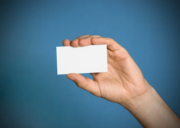 Hand with visiting card — Stock Photo, Image