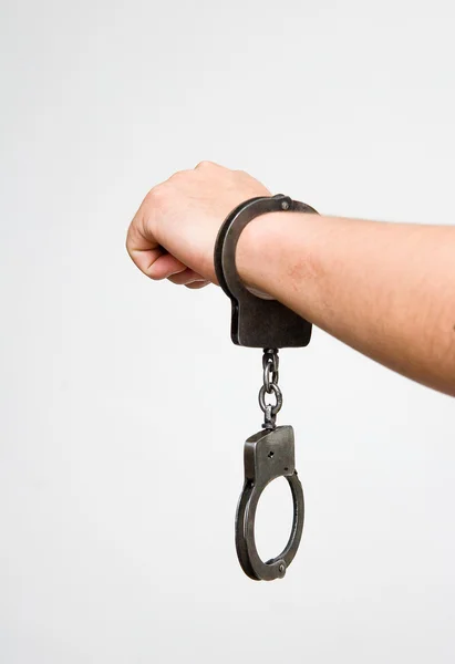 Сталеві поліцейські наручники — стокове фото