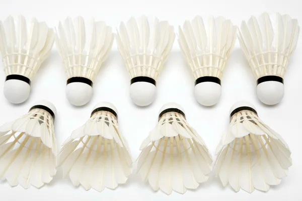 Two rows of white shuttlecocks — Stock Photo, Image