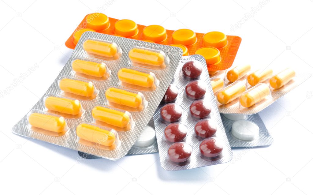 Tablets in packing lies on white background in good supply