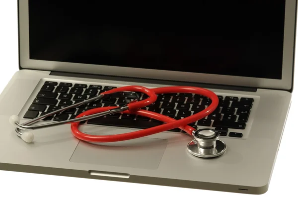 stock image Stethoscope on a laptop