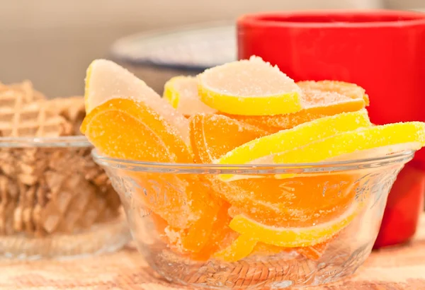 stock image Marmalade lemon and orange slices, biscuits, cup