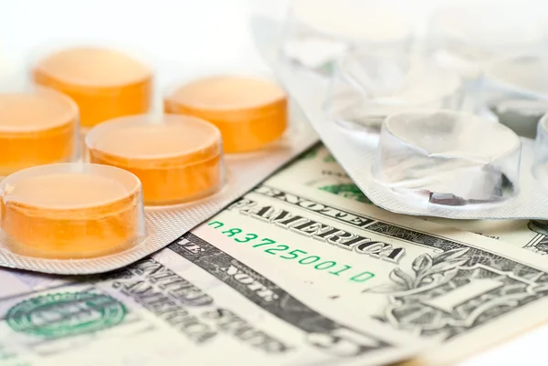 stock image American money and empty and full packing of medicines