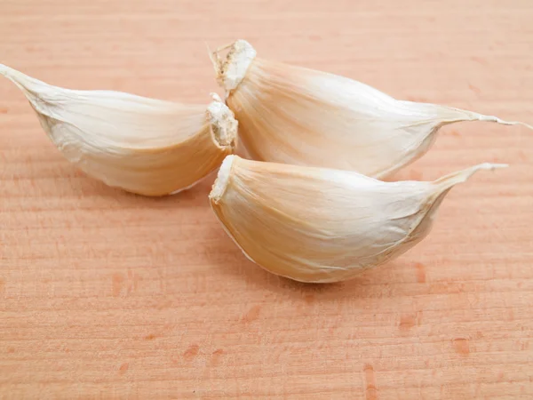 Tři segmenty česneku — Stock fotografie