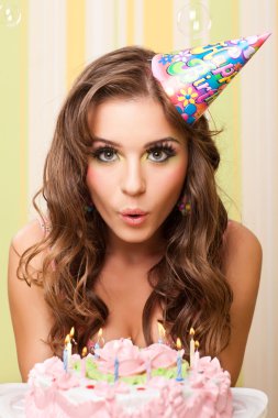 Teen blowing candles clipart