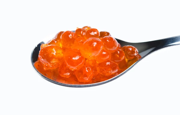 stock image Red caviar in a spoon isolated on white