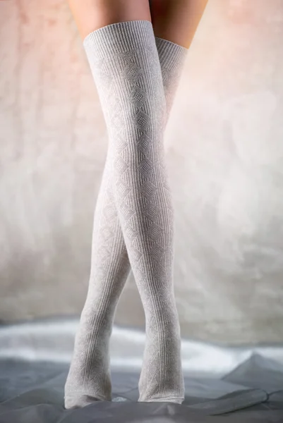 Beautiful woman legs in cotton stockings — Stock Photo, Image