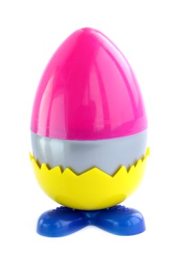 Plastic, many-colored Easter egg against the white background clipart