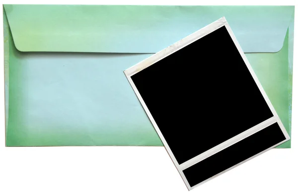 Envelope com moldura de foto vazia — Fotografia de Stock