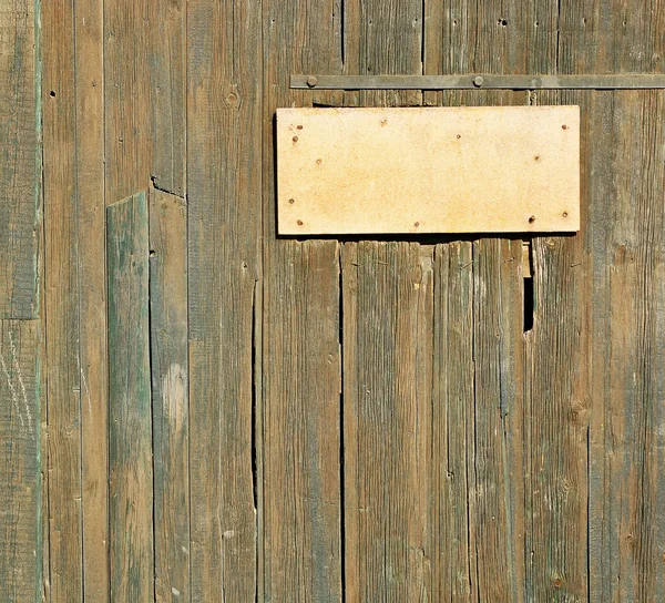 Fondo grunge de madera con una placa vintage para su texto . —  Fotos de Stock