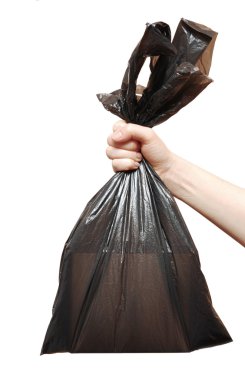 kadın el siyah çöp torbasına