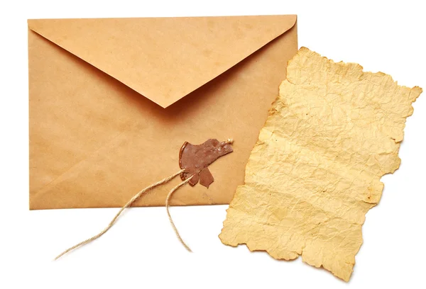 Старая бумага и открытый конверт — стоковое фото
