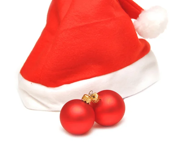 Santa hat with red christmas ball — Stock Photo, Image