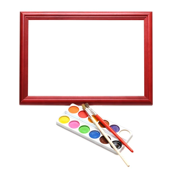Paintbrush, wood frame and paint — Stock Photo, Image