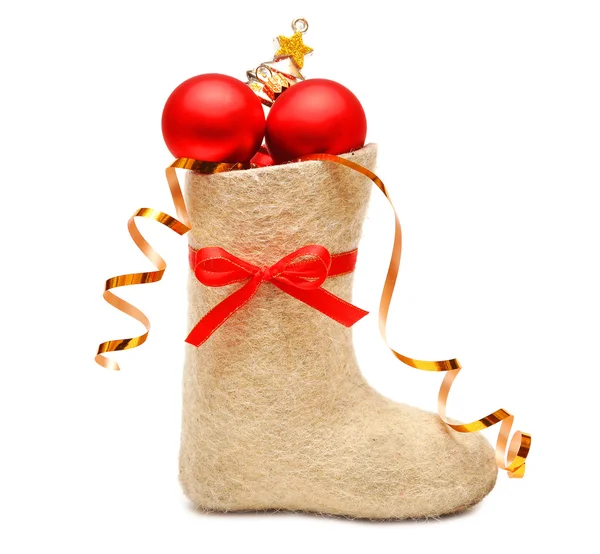 Dětská bota plný dárků — Stock fotografie