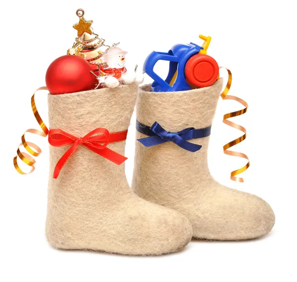 Children's boots with gifts — Stock Photo, Image