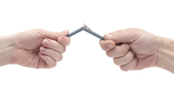 Hands snapping a pencil — Stock Photo, Image