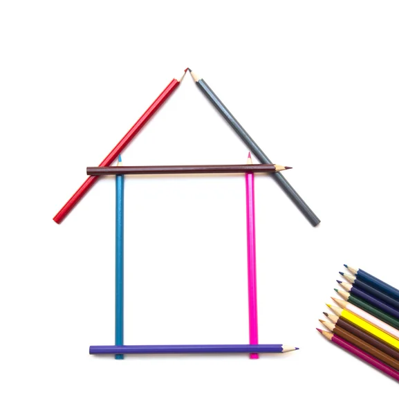 彩色铅笔在房子的形状 — 图库照片
